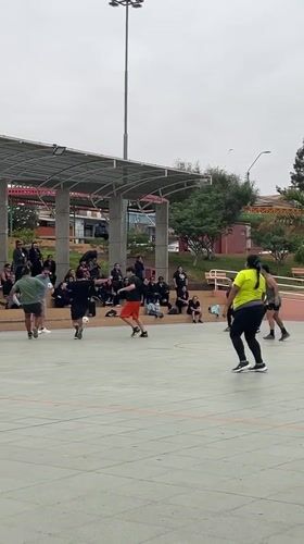 Community soccer game draws crowds to Arica sports court