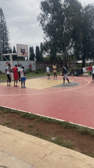 Basketball game played on outdoor court in Jos, Nigeria
