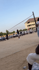 Volleyball match played on dirt court in Maiduguri