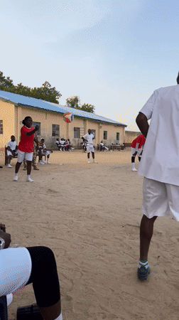 Volleyball match played on dirt court in Maiduguri