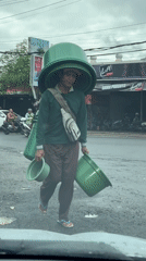 Post-rain street activity captured in Kuta Selatan, Indonesia