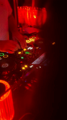DJ performs at red-lit nightclub in Yerevan