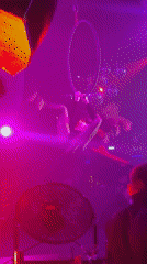 Aerial acrobat performs hoop routine in Moscow nightclub