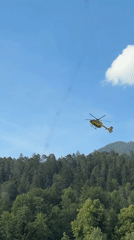 ADAC helicopter in the air, modern medical facility interior