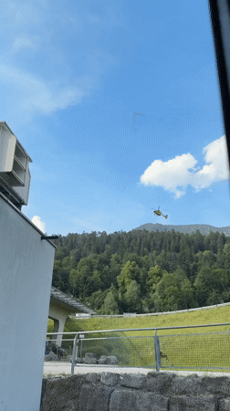 ADAC helicopter in the air, modern medical facility interior