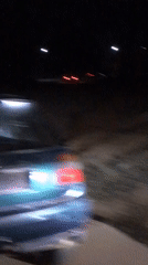 Evening traffic and electronics shop activity in Galadimawa, Nigeria