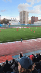 Football match concludes at Smolensk stadium under overcast skies
