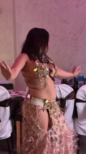 Belly dancer with wings performs at Neftekamsk restaurant gathering