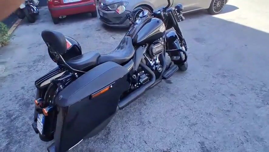 Black Harley-Davidson motorcycle observed in Savona industrial area