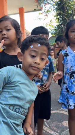 Children participate in morning activities in Kediri, Indonesia