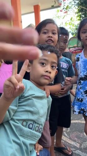 Children participate in morning activities in Kediri, Indonesia
