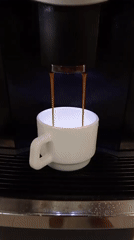 Coffee machine dispenses espresso in Santiago cafe
