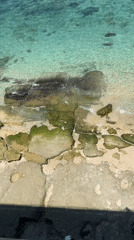 Two swimmers spotted in clear waters near Ungasan, Indonesia