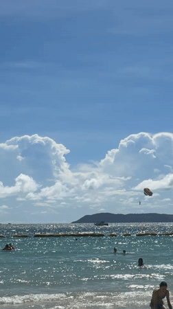 Sunny morning beach activity recorded in Pattaya, Thailand