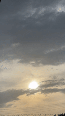 Overcast skies with warm glow observed in Jos, Nigeria