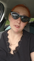 Woman in sunglasses observed driving in Chaikovsky, Russia