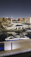 Evening waterfront walk through Doha's Pearl-Qatar marina district