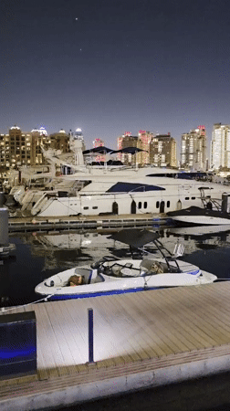 Evening waterfront walk through Doha's Pearl-Qatar marina district