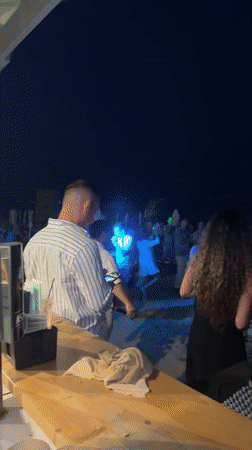 Varna beach party night: DJ booth, lights, and summer crowds