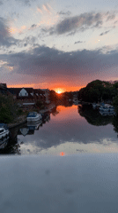 Colorful Thames sunset with docked boats, Reading UK