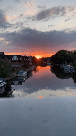 Colorful Thames sunset with docked boats, Reading UK