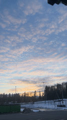 Winter sunset captured over Lupanovo, Russia countryside
