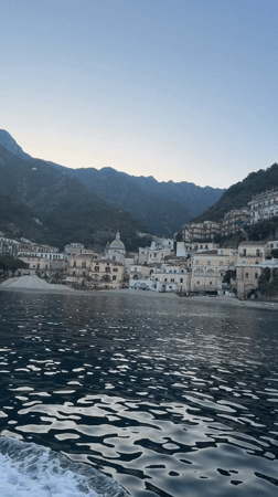Boat passenger films Amalfi Coast town from water