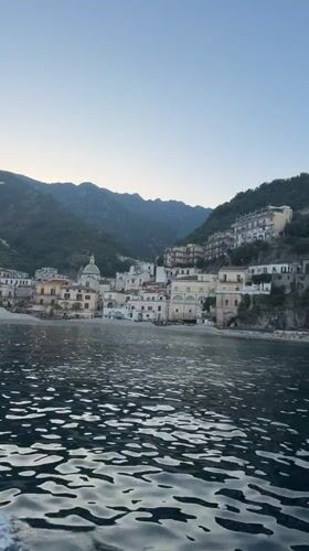 Boat passenger films Amalfi Coast town from water