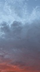 Vivid summer sunset over Zvezdara's rooftops and cranes
