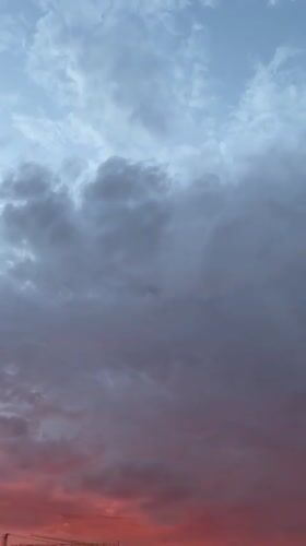 Vivid summer sunset over Zvezdara's rooftops and cranes