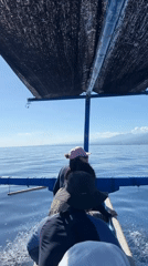 Boat with three passengers travels Indonesian waters