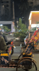 Evening street life captured in busy Dhaka commercial district