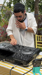 Outdoor social gathering with DJ draws crowd in Tel Aviv