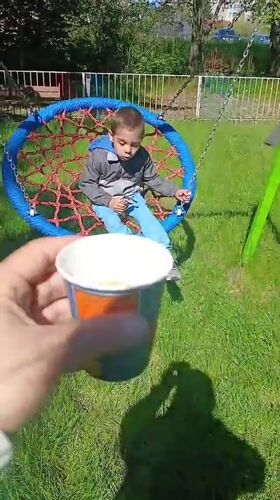 Morning coffee break at Dobrich playground swing set
