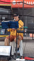Saxophone performance outside a Svietlahorsk coffee shop
