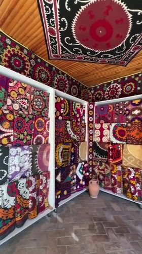 Exploring Samarkand's monuments, textile shops, and ceramic markets