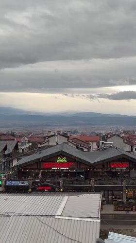 Cloudy afternoon views captured across Bansko's mixed architecture