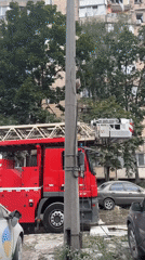 Kyiv apartment building heavily damaged, emergency crews on scene