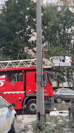 Kyiv apartment building heavily damaged, emergency crews on scene