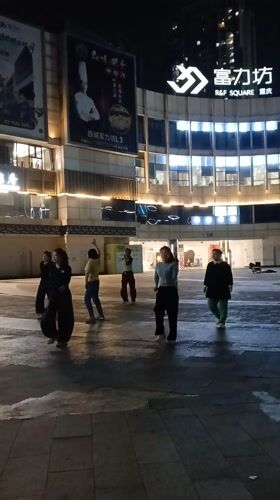 Women square dancing in Chongqing plaza interrupted by scooter