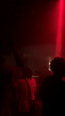 Late-night DJ set at a darkened Tel Aviv club
