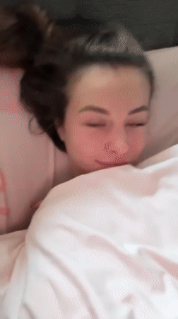 Woman takes midday nap in Kyiv after cold weather