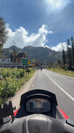 Scooter ride and volcanic landscape near Mount Bromo, East Java