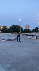 Skateboarder practices tricks at graffiti-covered Badalona skatepark