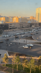 Daytime intersection footage captured in Astana, Kazakhstan