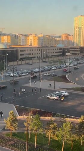 Daytime intersection footage captured in Astana, Kazakhstan