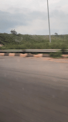 Banana truck travels road in Egbeda, Nigeria