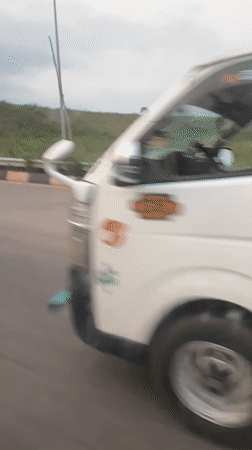 Banana truck travels road in Egbeda, Nigeria