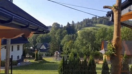 Rural mountain homestead on a clear summer morning