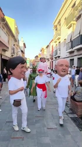 Traditional giant puppet festival procession held in Ripollet, Spain